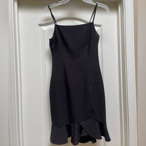 Women’s black ruffled hem dress. Size S. Worn once.